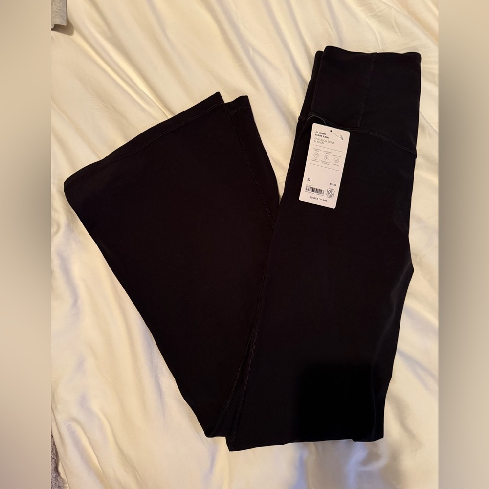 NWT Athleta elation flare pants in black